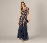Petite Hand Beaded Short Sleeve Floral Godet Gown In Navy Rosegold